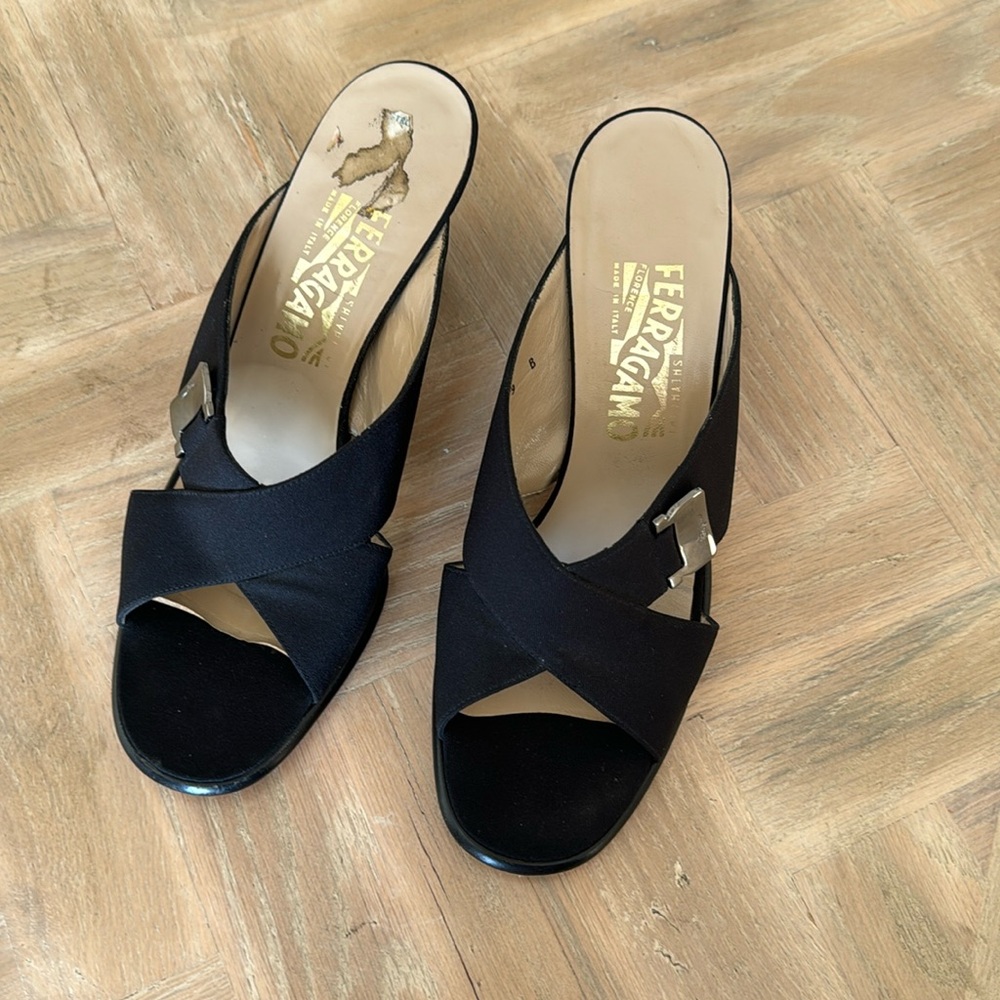 Ferragamo Black slides.